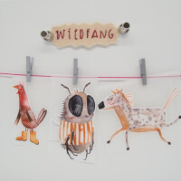 EMBROIDERED WILDFANG